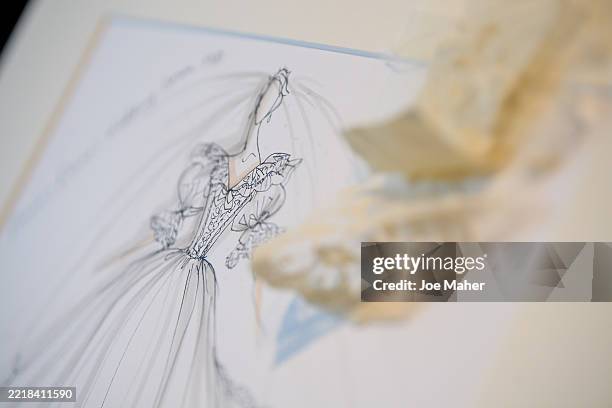 Sketches of Diana, Princess of Wales' wedding dress are displayed ahead of the largest collection of Diana, Princess of Wales clothing to be...
