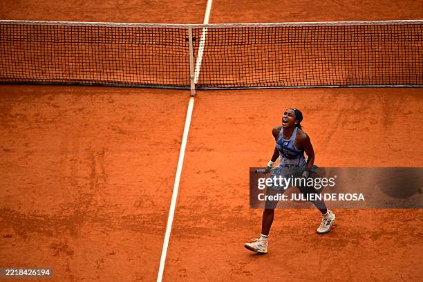 Coco Gauff celebrates after winning her women's singles final match against Belarus' Aryna Sabalenka on day 14 of the French Open tennis tournament...