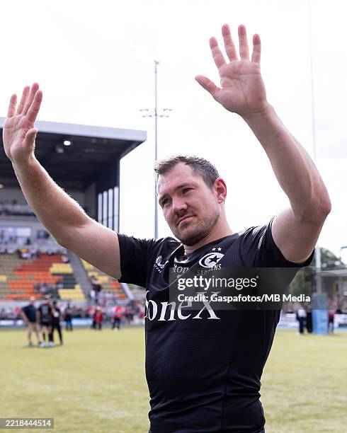 Alex Goode of Saracens waves the fans after their sides victory following the Gallagher Premiership Rugby match between Saracens and Bath Rugby at...
