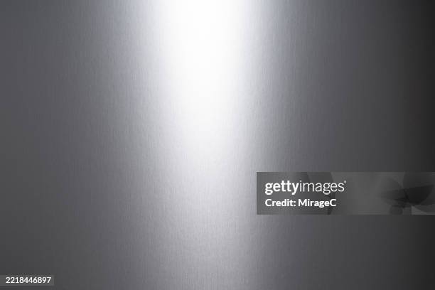 glowing silver texture background - hoja de aluminio fotografías e imágenes de stock