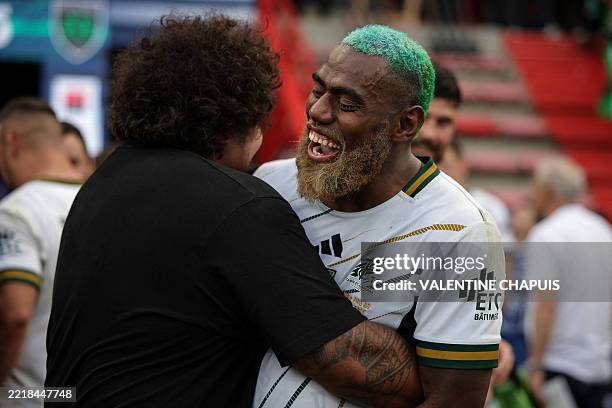 Montauban's Fijian wing Josua Vici celebrates after winning the French Pro D2 rugby union final match between FC Grenoble and US Montalbanaise at the...