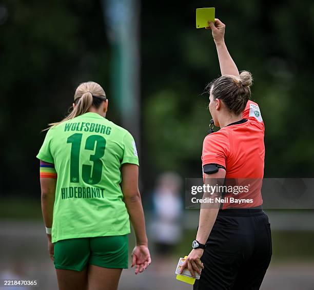 Referee, Jacqueline Herrmann shows Nia Hildebrandt of VfL Wolfsburg a yellow card during the DFB B-U17 Girls Cup Final match between TSG 1899...
