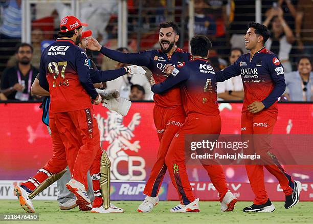 Virat Kohli of Royal Challengers Bengaluru celebrates winning with teammates after the 2025 IPL Final match between Royal Challengers Bengaluru and...