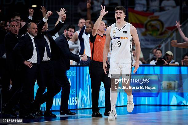 Hugo Gonzalez of Real Madrid and xxxxxxxxxx of Baskonia in action during first game of Quarter Finals of Liga Endesa Playoff match between Real...
