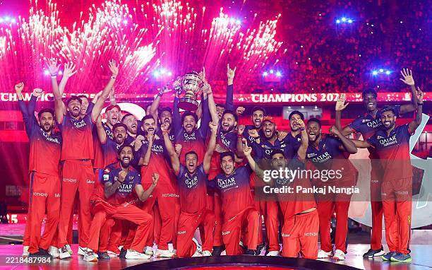 Rajat Patidar of Royal Challengers Bengaluru lifts the IPL trophy ...