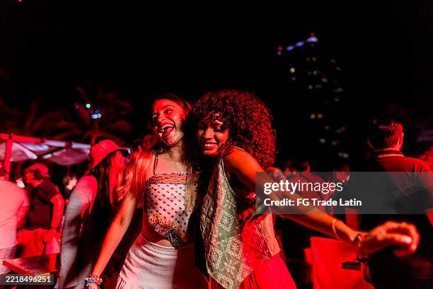 young friends women dancing during party outdoors - dance music stock pictures, royalty-free photos & images
