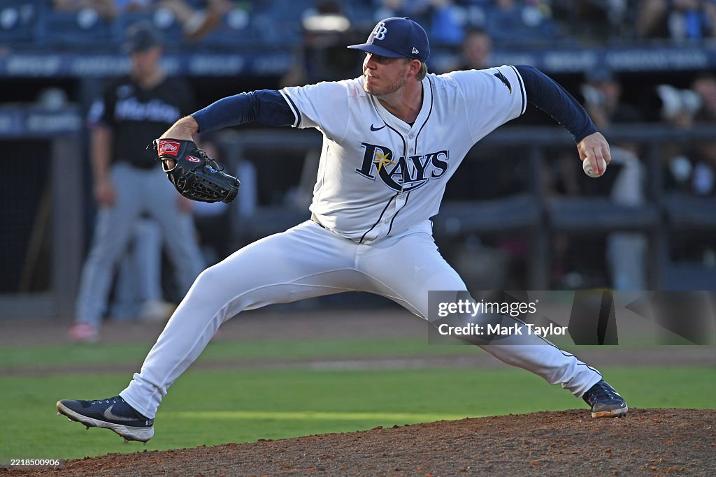 Miami Rays Garrett Cleavinger of the Tampa Bay Rays pitches in the tenth inning ...