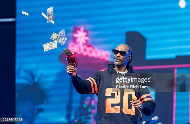 Snoop Dogg performs during a pre-game concert prior to the start of the CFL game between the B.C. Lions and the Edmonton Elks at BC Place on June 7,...