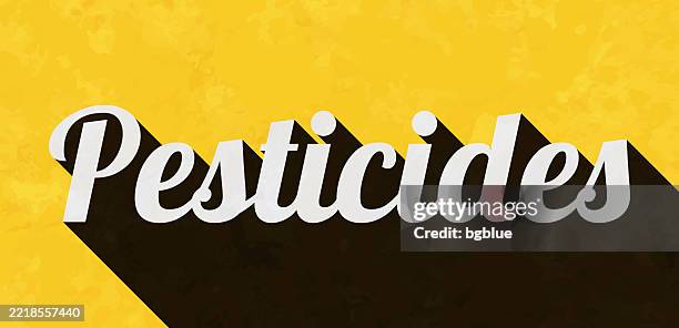 pesticides - text with long shadow on textured yellow background - crop duster stock illustrations