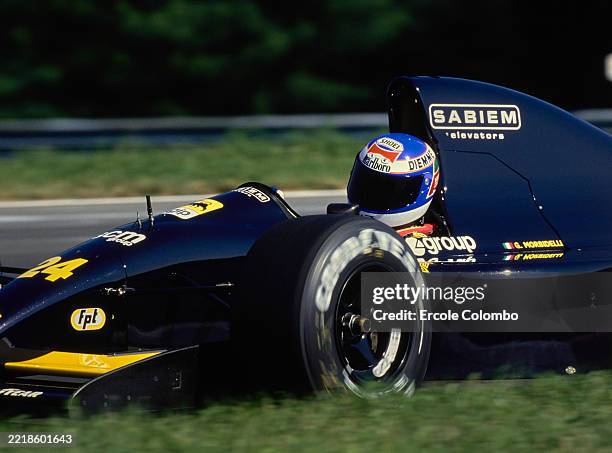 Tight cockpit side view of Gianni Morbidelli from Italy driving the Minardi F1 Team Minardi M191 Ferrari 037 V12 during practice for the Formula One...