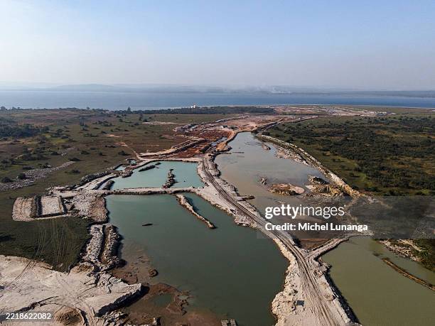 An aerial view reveals the environmental toll of artisanal cobalt and copper mining, on May 24, 2025 in Kolwezi, Democratic Republic of Congo. The...