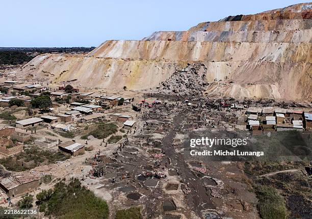An aerial view shows artisanal miners working in harsh conditions at a cobalt and copper site on May 26, 2025 near Kolwezi, Democratic Republic of...