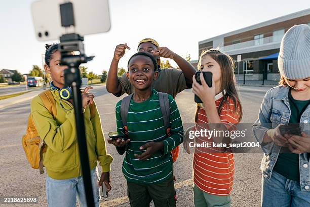 creative minds students vlogging with cellphone setup - student record stock pictures, royalty-free photos & images