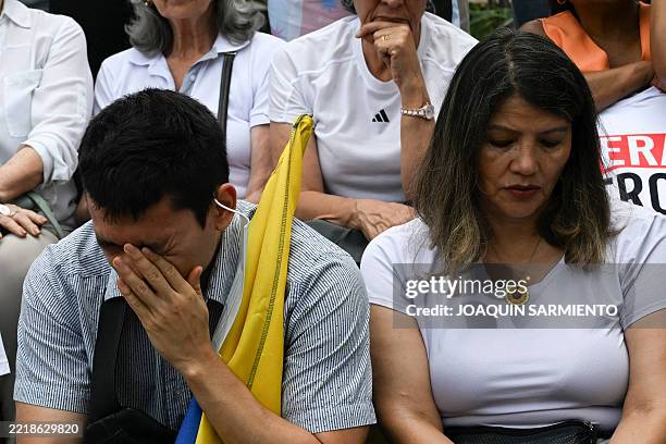 Man cries during a protest against violence and in favor of peace in Cali, Colombia, on June 8 the day after the attack on presidential candidate...