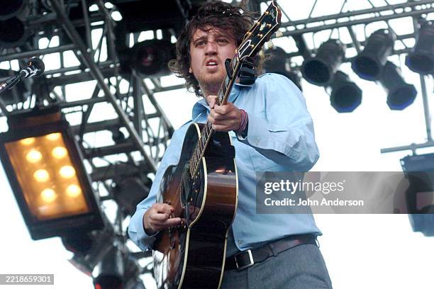 French Pop & Alternative Rock musician Christian Mazzalai, of the group Phoenix, plays acoustic guitar as he performs, during the Austin City Limits...