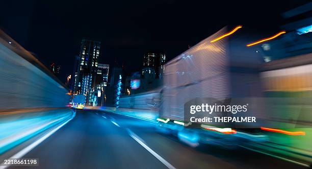 speeding truck on tokyo expressway at night - pick up truck stock pictures, royalty-free photos & images