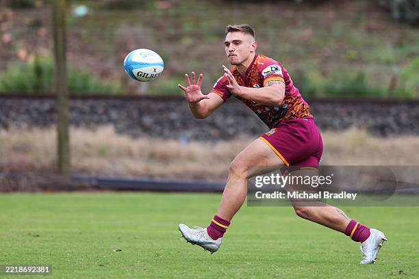 Cortez Ratima of the Chiefs catches the ball during a Chiefs Super Rugby training session at Chiefs HQ on June 05, 2025 in Hamilton, New Zealand.