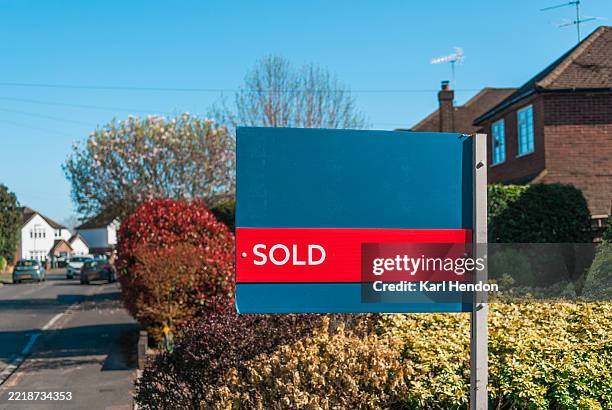 houses and gardens - sold sign - greater manchester stock pictures, royalty-free photos & images