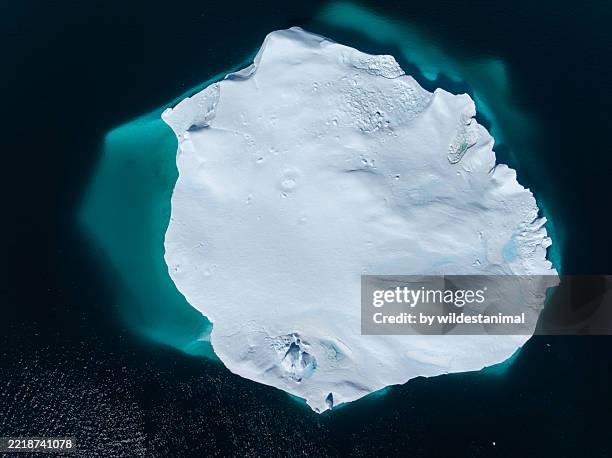 aerial view of a large iceberg, antarctica.. - ice-floe stock pictures, royalty-free photos & images