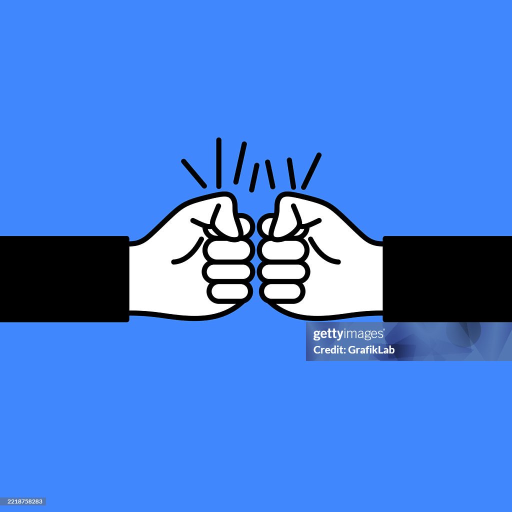 Fists Two Fists Bumping Together Signifying Unity And Agreement High-Res ...