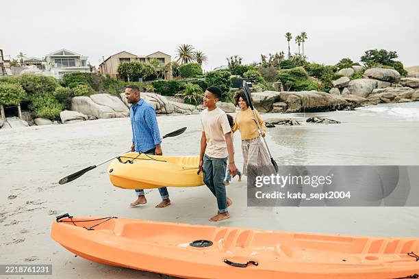 insured, relaxed, and reconnected - travel insurance family stock pictures, royalty-free photos & images