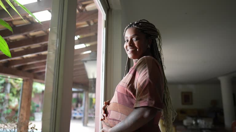 https://media.gettyimages.com/id/2218770907/video/portrait-of-a-pregnant-woman-touching-her-belly-at-home.jpg?b=1&s=640x640&k=20&c=EtS8jzcY0VyS5RokU8htMeZnr4PmjepDBIs_hjneqb4=
