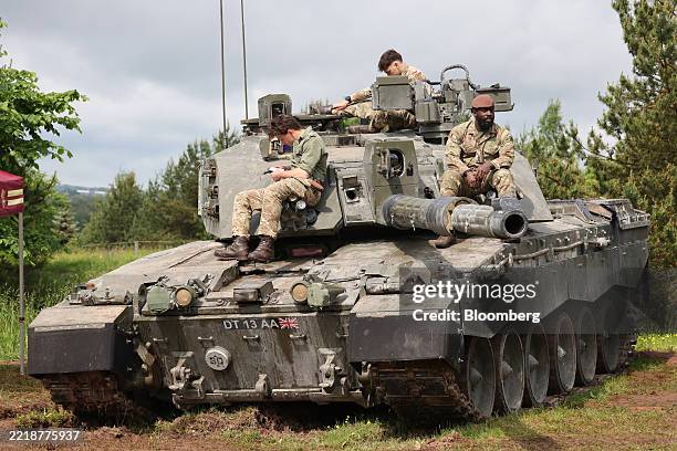 British Army soldiers aboard a Challenger 2 battle tank at the Estonian Aviation Days festival in Tartu, Estonia, on Sunday, June 8, 2025. Estonia...