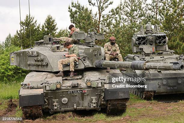 British Army soldiers aboard a Challenger 2 battle tank at the Estonian Aviation Days festival in Tartu, Estonia, on Sunday, June 8, 2025. Estonia...