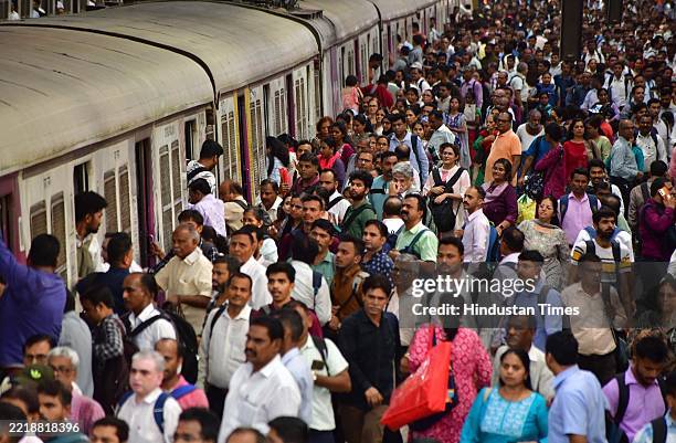 Massive crowd waiting to catch their local train to reach their destination at CSMT railway station on June 9, 2025 in Mumbai, India. Four commuters...