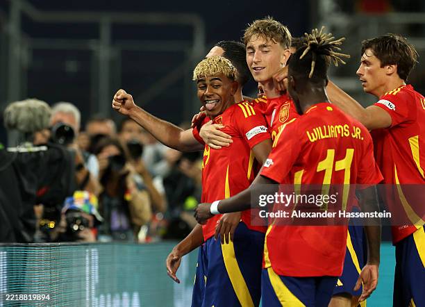 Lamine Yamal of Spain celebrates scoring his team's third goal with teammates during the UEFA Nations League 2025 semifinal match between Spain and...