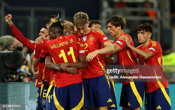 Lamine Yamal of Spain celebrates scoring his team's third goal with teammates during the UEFA Nations League 2025 semifinal match between Spain and...