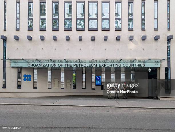 Armed security personnel and Austrian military soldiers stand guard outside the headquarters of the Organization of the Petroleum Exporting Countries...