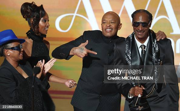US rapper Dr. Dre presents the BET Ultimate Icon Award to US rapper ...