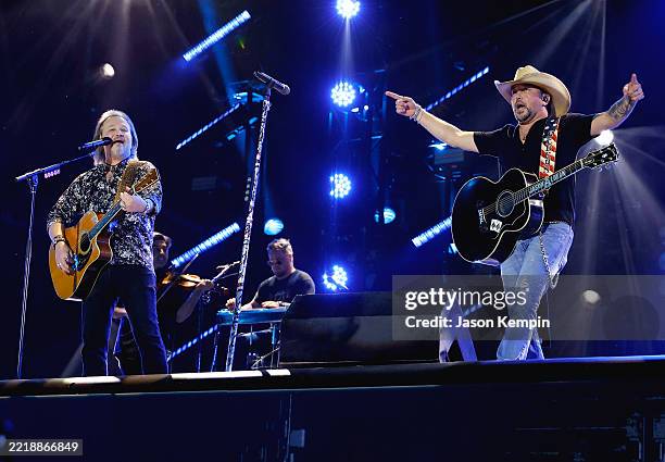 Travis Tritt and Jason Aldean perform on the main stage during CMA Fest 2025 at Nissan Stadium on June 05, 2025 in Nashville, Tennessee.