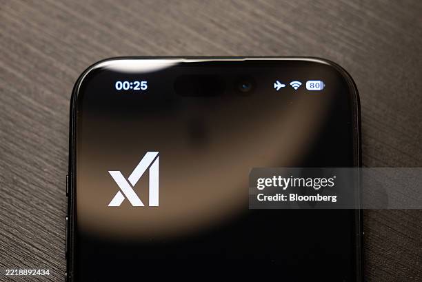 The logo of xAI on a smartphone arranged in Riga, Latvia, on Monday, June 9, 2025. Announced in March, XAI Holdings was created from the combination...