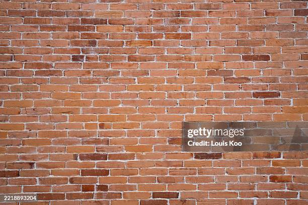 brick wall background - bakstenen muur stockfoto's en -beelden