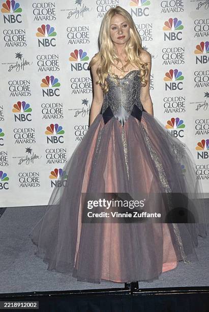 Australian-American actress Portia de Rossi, wearing a grey evening gown, in the 56th Golden Globe Awards press room at the Beverly Hilton Hotel in...