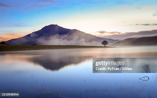 scenic view of lake against sky,vietnam - stratovolcano stock pictures, royalty-free photos & images