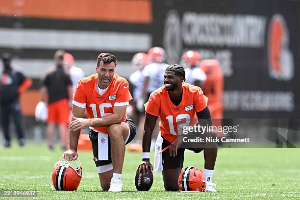 Joe Flacco and Shedeur Sanders of the Cleveland Browns laugh during Cleveland Browns mandatory minicamp at CrossCountry Mortgage Campus on June 10,...