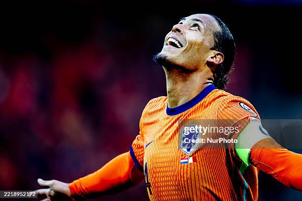 Netherlands defender Virgil van Dijk celebrates the goal during the match between the Netherlands and Malta at the Euroborg Stadium for the European...