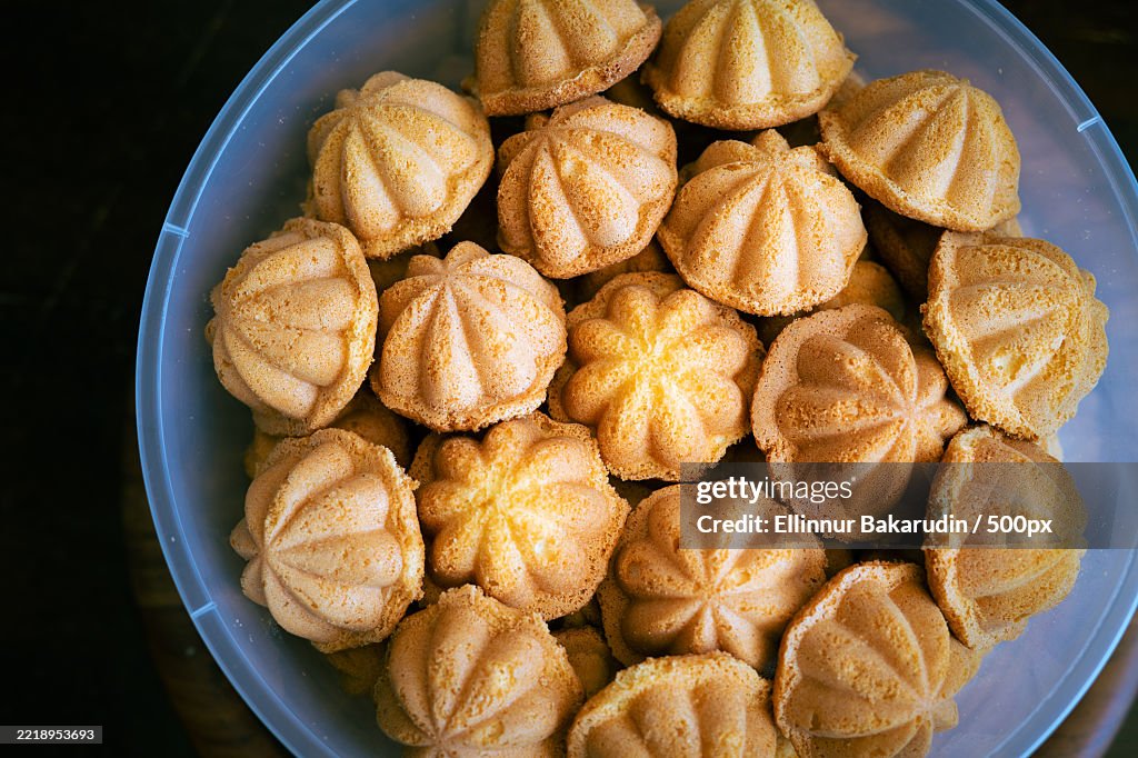 Kuih Bahulu,Baulu or bolu in a container Sponge cake baked in special aluminium moulds is the Asian tradition food in popular Malaysia and Indonesia