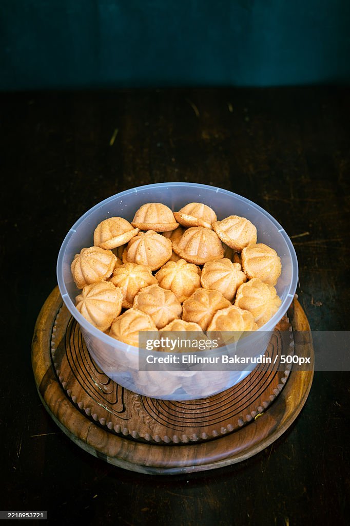 Kuih Bahulu,Baulu or bolu in a container Sponge cake baked in special aluminium moulds is the Asian tradition food in popular Malaysia and Indonesia