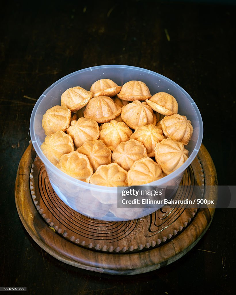 Kuih Bahulu,Baulu or bolu in a container Sponge cake baked in special aluminium moulds is the Asian tradition food in popular Malaysia and Indonesia