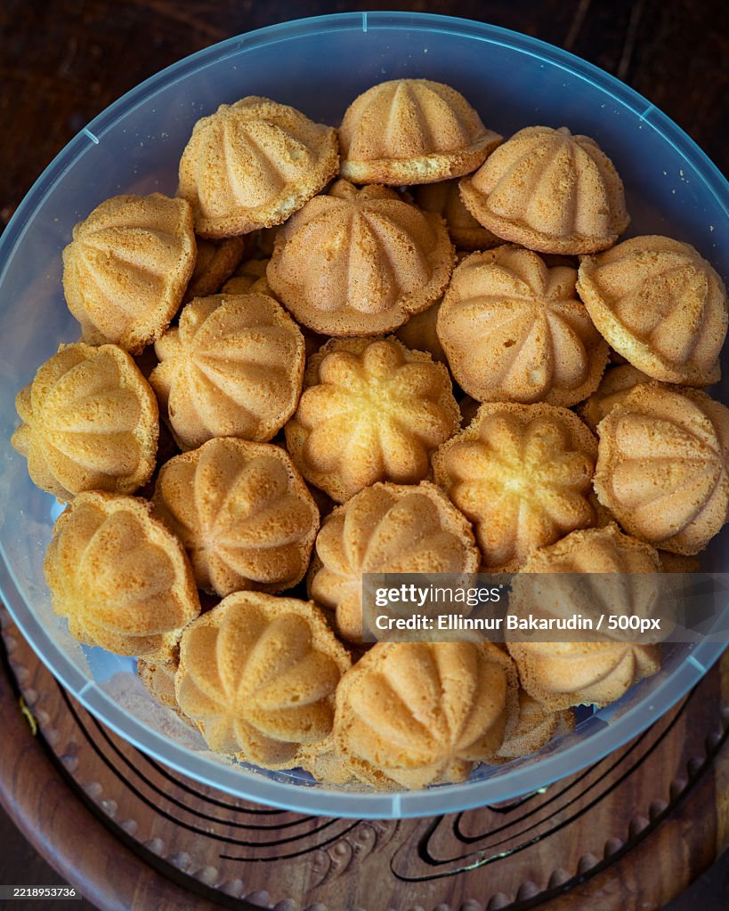 Kuih Bahulu,Baulu or bolu in a container Sponge cake baked in special aluminium moulds is the Asian tradition food in popular Malaysia and Indonesia