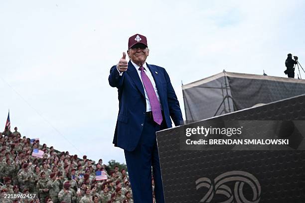 President Donald Trump gives a thumbs up as he speaks at Fort Bragg, a US Army military installation, near Fayetteville, North Carolina, on June 10,...