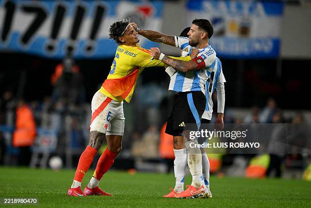 Colombia's midfielder Richard Rios argues with Argentina's defender Nicolas Otamendi during the 2026 FIFA World Cup South American qualifiers...