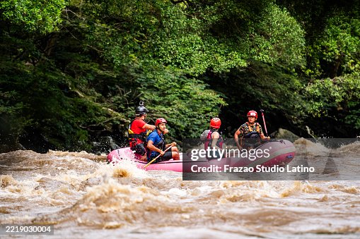 Friends rafting on a river Friends rafting on a river