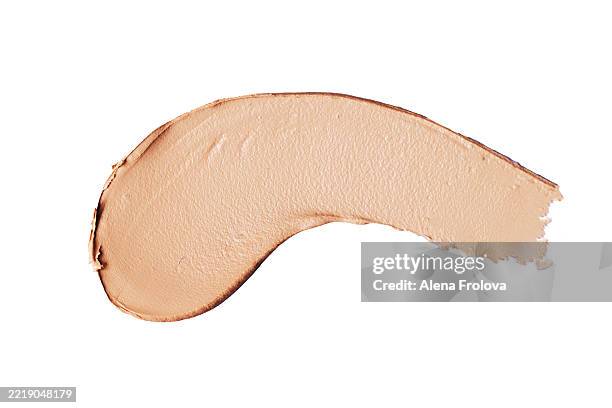 the texture of liquid foundation swatch of foundation on white background - foundation make up stock pictures, royalty-free photos & images