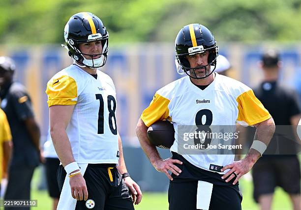 Will Howard and Aaron Rodgers of the Pittsburgh Steelers look on during Minicamp at UPMC Rooney Sports Complex on June 11, 2025 in Pittsburgh,...