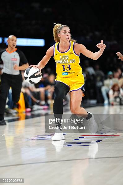 Sarah Ashlee Barker of the Los Angeles Sparks moves the ball against